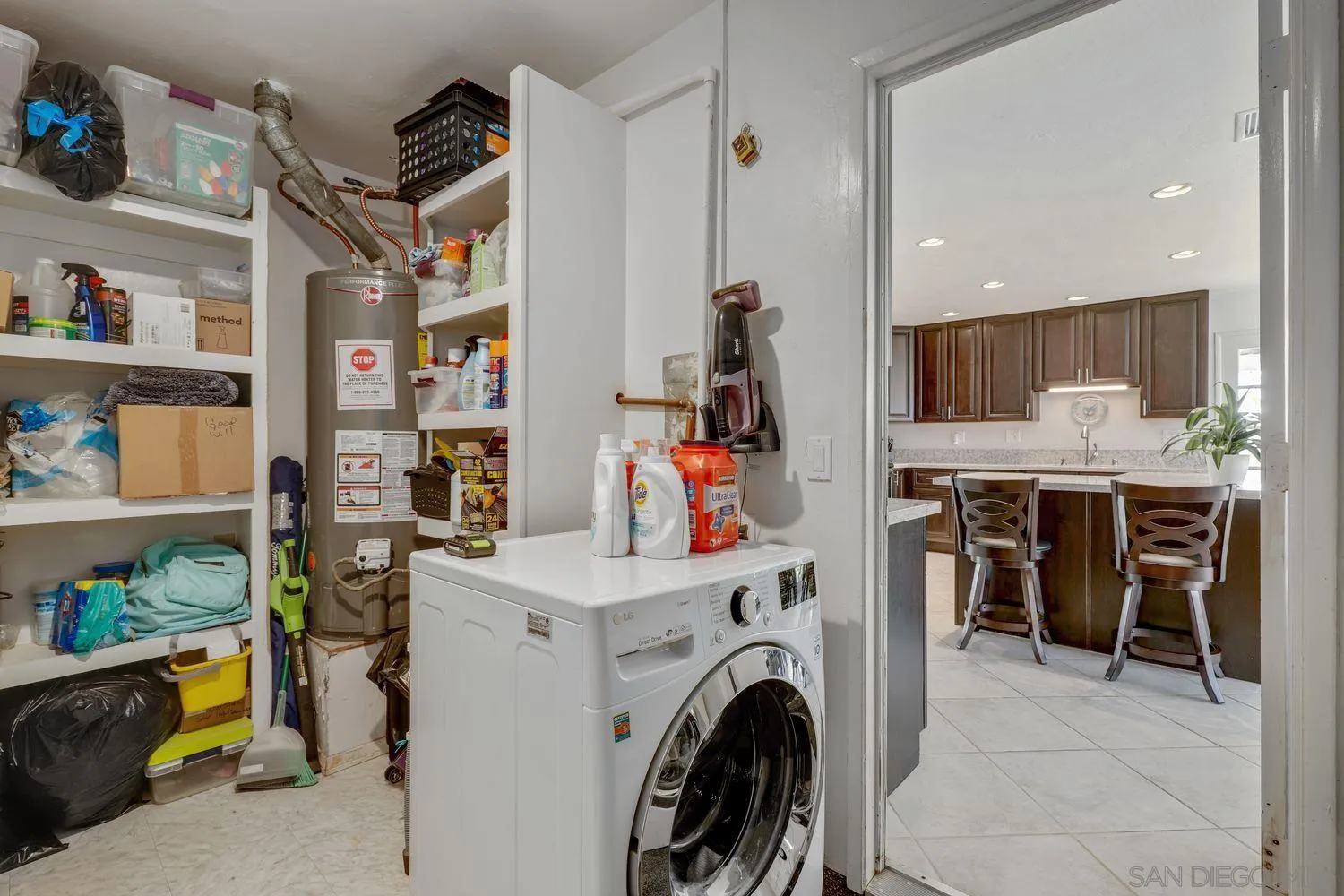 8531 Menkar Road San Diego, CA 92126 - Photo 23 of 37 a view of livingroom with furniture and toys