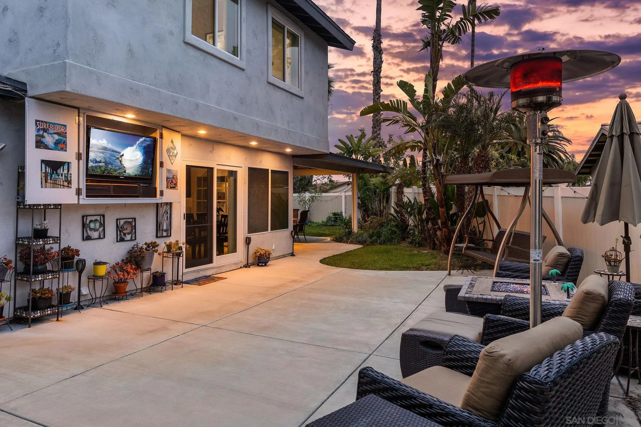 8531 Menkar Road San Diego, CA 92126 - Photo 26 of 37 a view of a building with barbeque and sitting area
