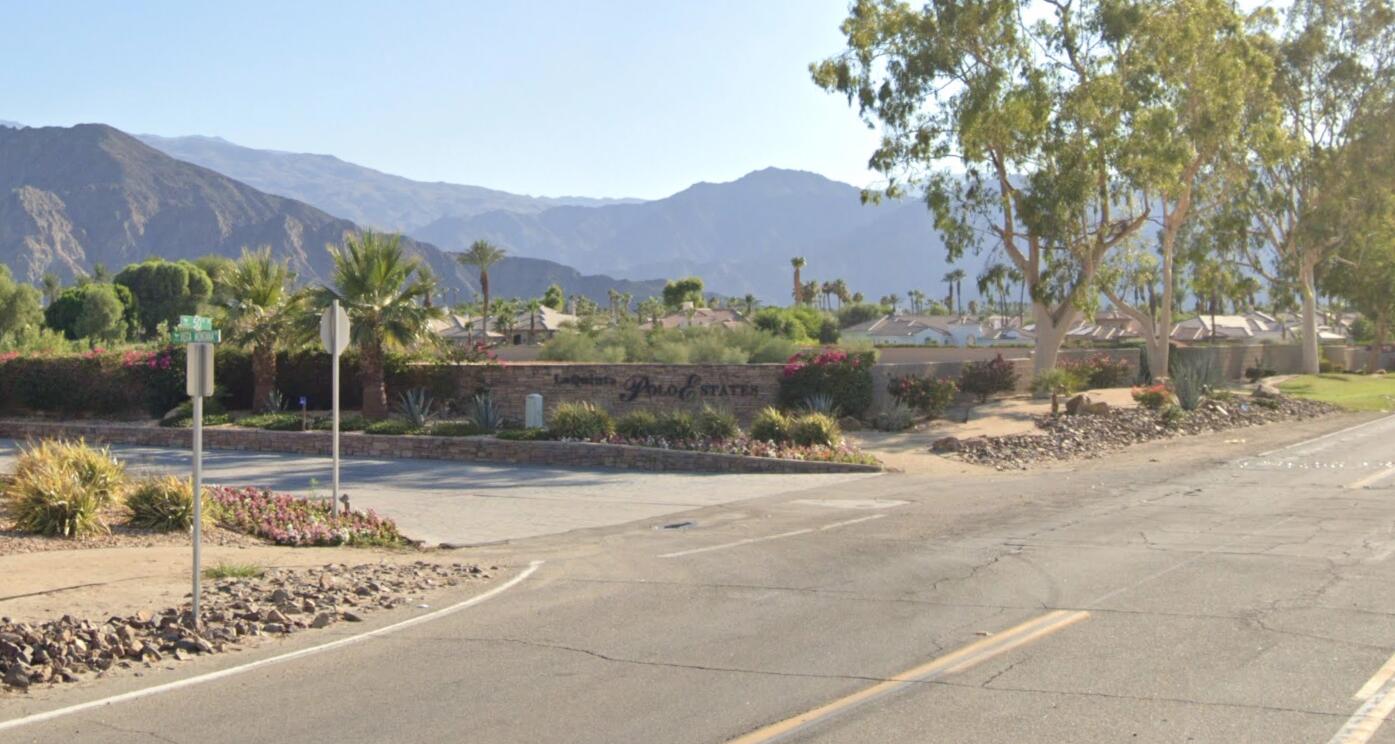 50175 Vista Montana Road La Quinta, CA 92253 - Photo 2 of 6 a backyard of a house with lots of green space