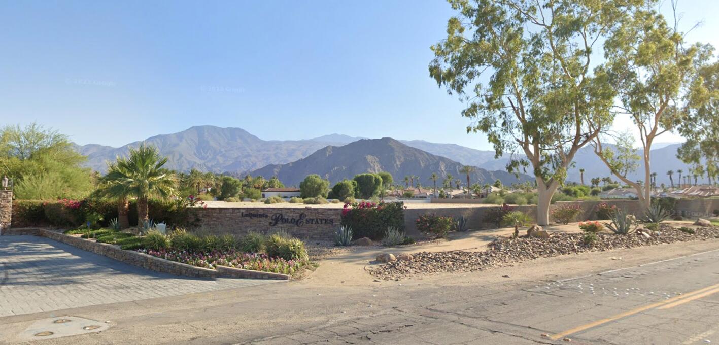 50175 Vista Montana Road La Quinta, CA 92253 - Photo 3 of 6 a view of a house with a yard