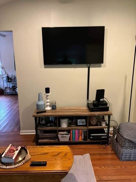 9 Maple Street Kingston, MA 02364 - Photo 17 of 31 a living room with furniture and a flat screen tv