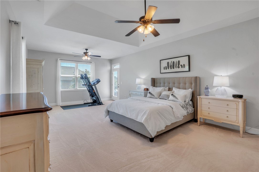 116 Stone Cottage Drive Anderson, SC 29621 - Photo 21 of 43 An elegant tray ceiling and soft carpet define this airy, well-proportioned bedroom retreat.
