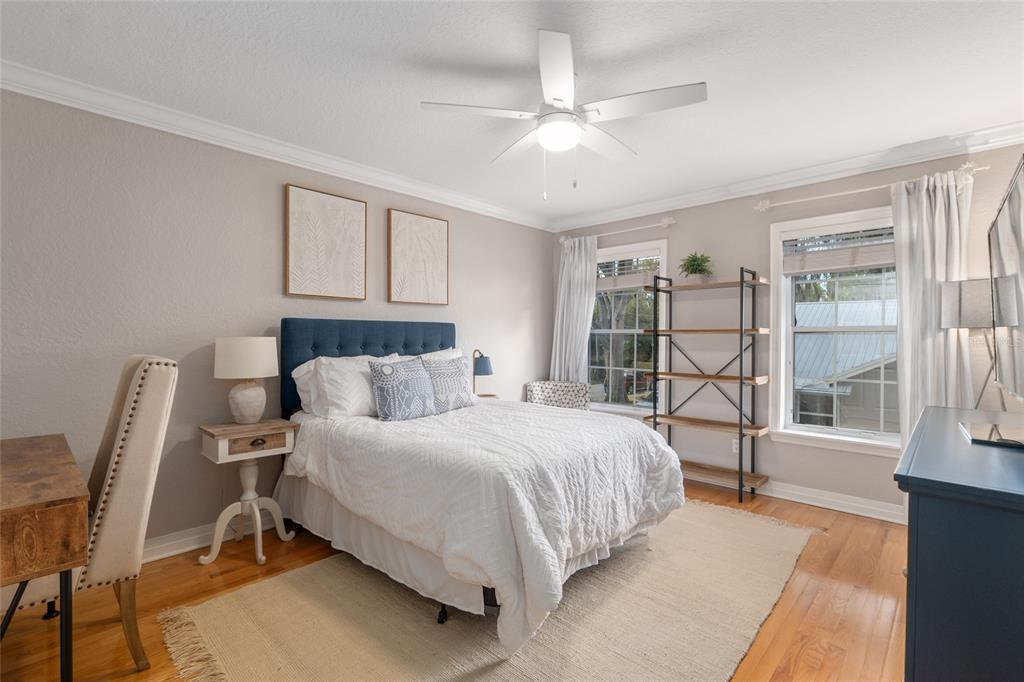 1107 Southeast 9th Avenue Ocala, FL 34471 - Photo 14 of 25 a bedroom with a large bed and a window
