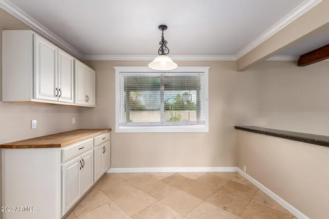 a kitchen with stainless steel appliances granite countertop a stove and a sink