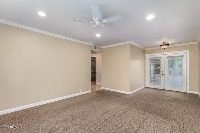 a view of empty room with windows