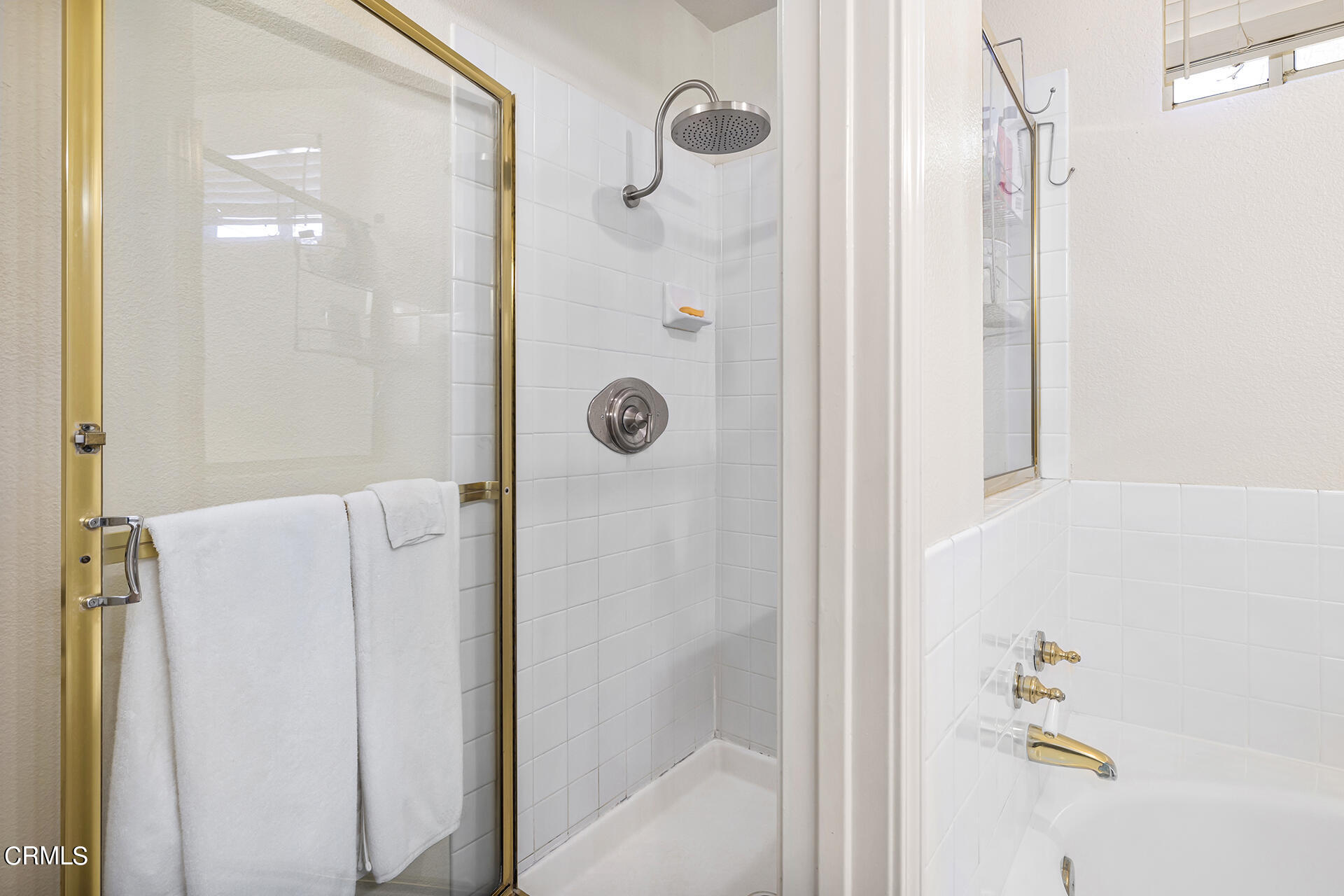 1094 Rocton Drive Pasadena, CA 91107 - Photo 17 of 25 a bathroom with a shower and a glass door