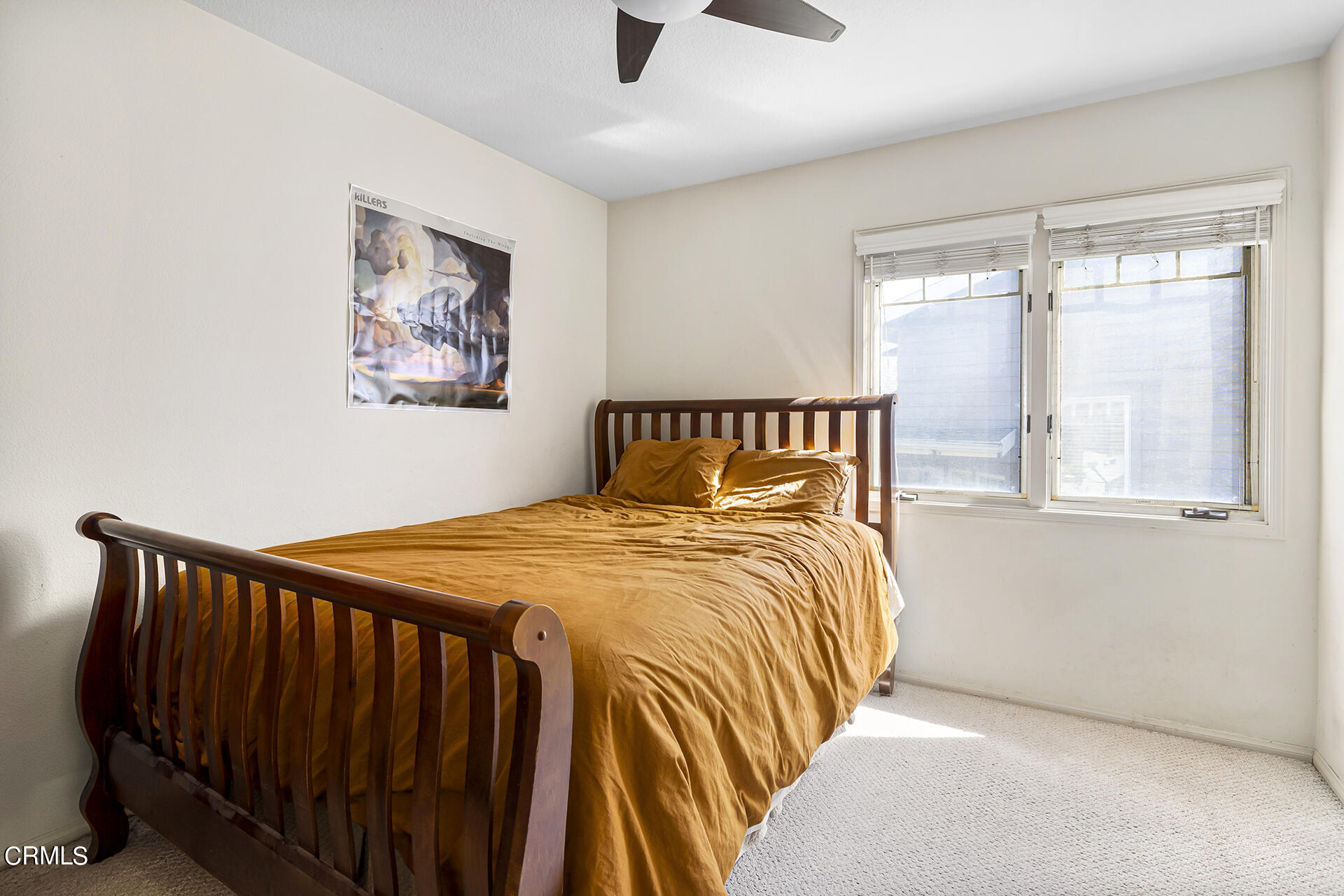 1094 Rocton Drive Pasadena, CA 91107 - Photo 20 of 25 a bedroom with bed and a window