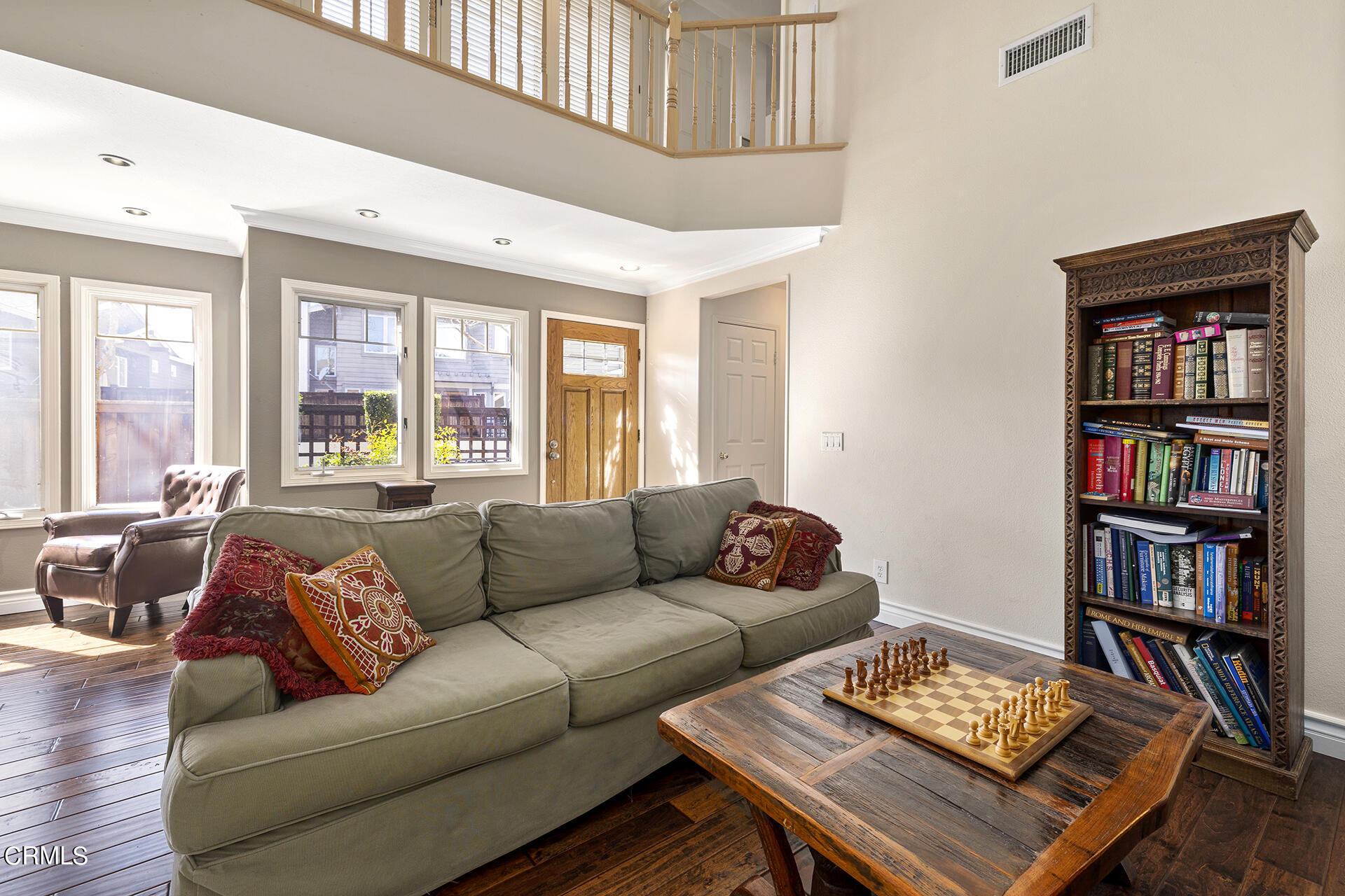 1094 Rocton Drive Pasadena, CA 91107 - Photo 6 of 25 a living room with furniture and a book shelf