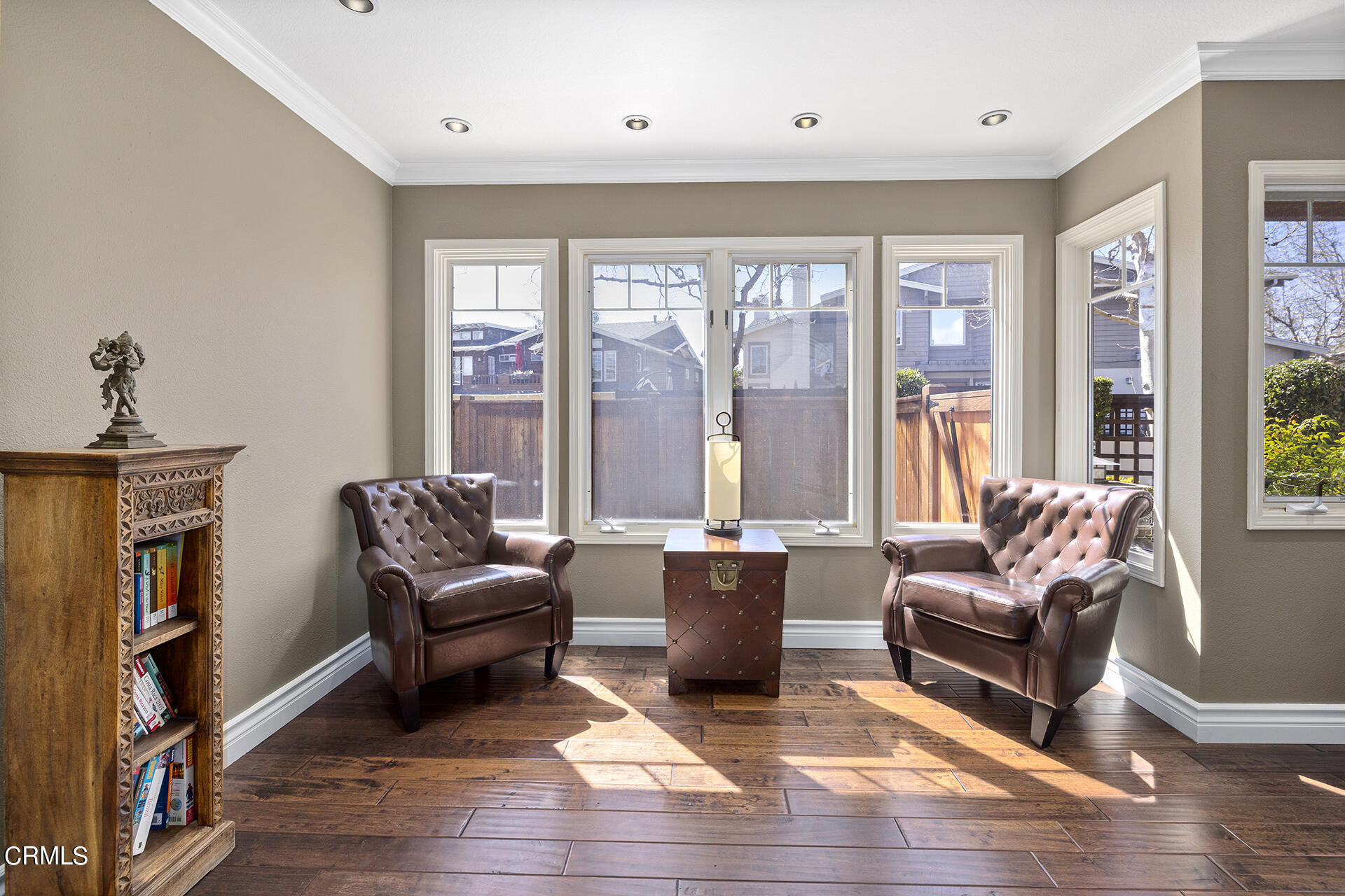 1094 Rocton Drive Pasadena, CA 91107 - Photo 8 of 25 a living room with furniture hard wood floor and a bookshelf