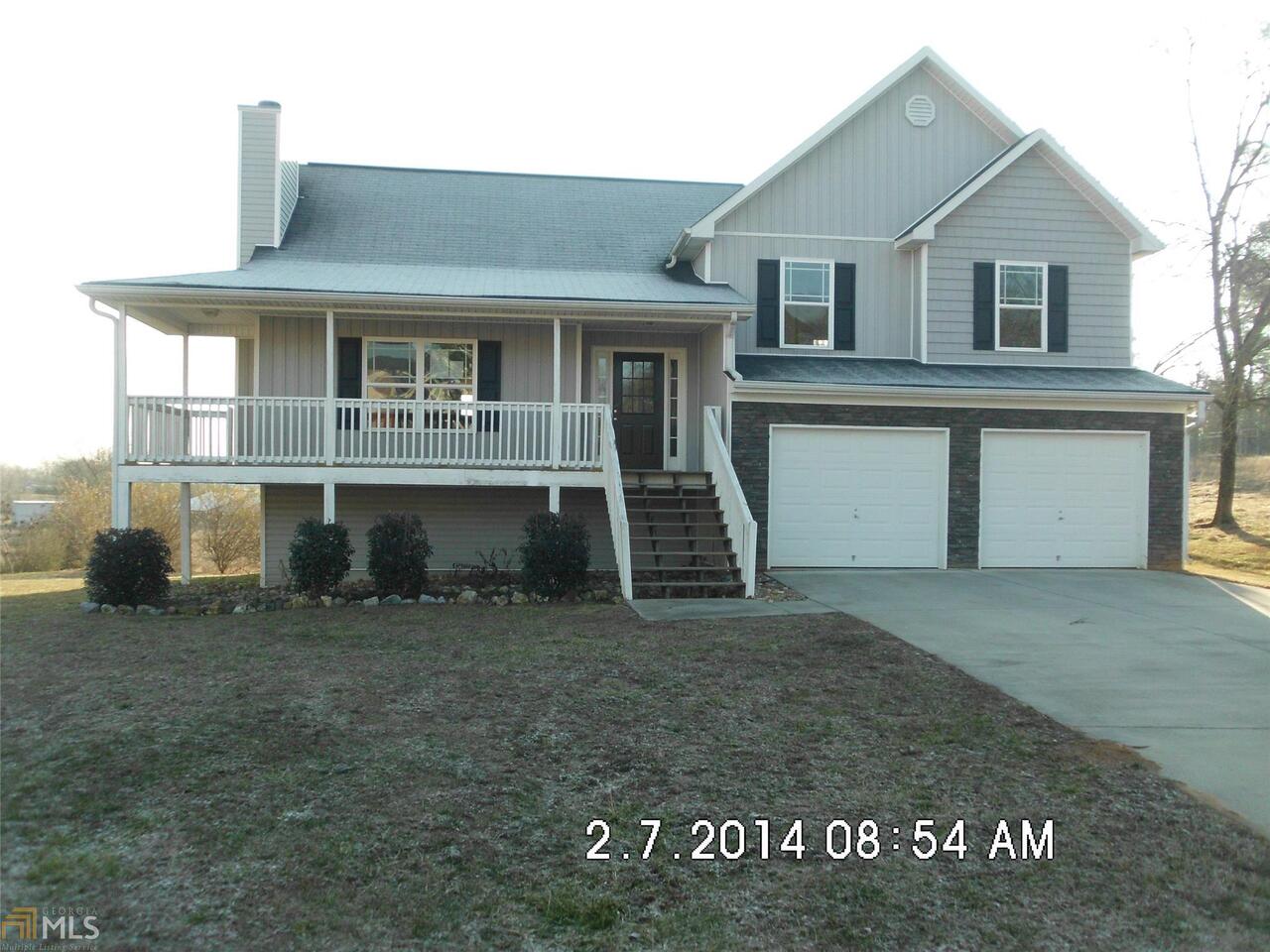 122 Long Ridge Drive Southeast Calhoun, GA 30701 - Photo 1 of 1 a front view of a house with a yard