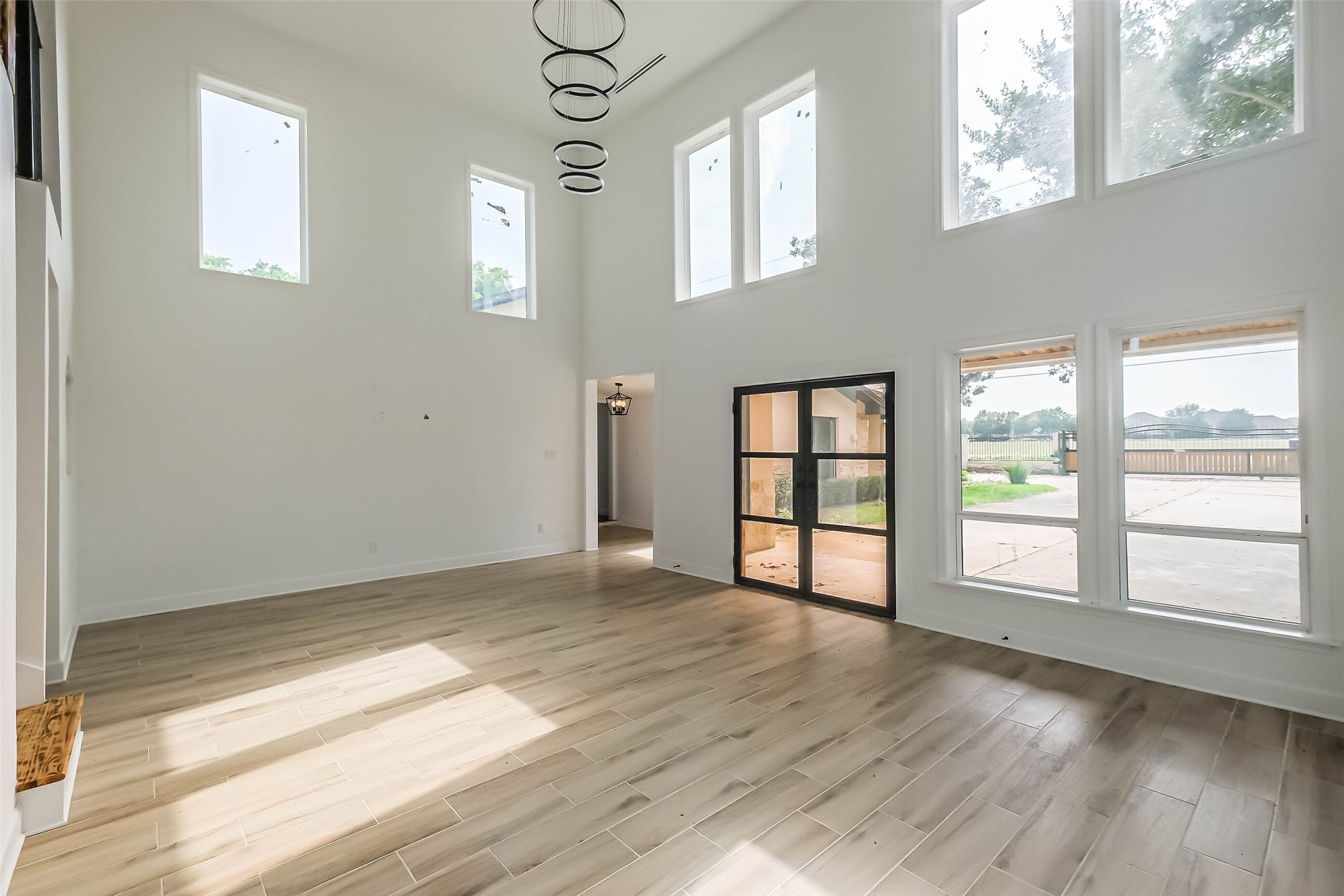 11019 Clodine Road Sugar Land, TX 77498 - Photo 27 of 39 an empty room with wooden floor and windows