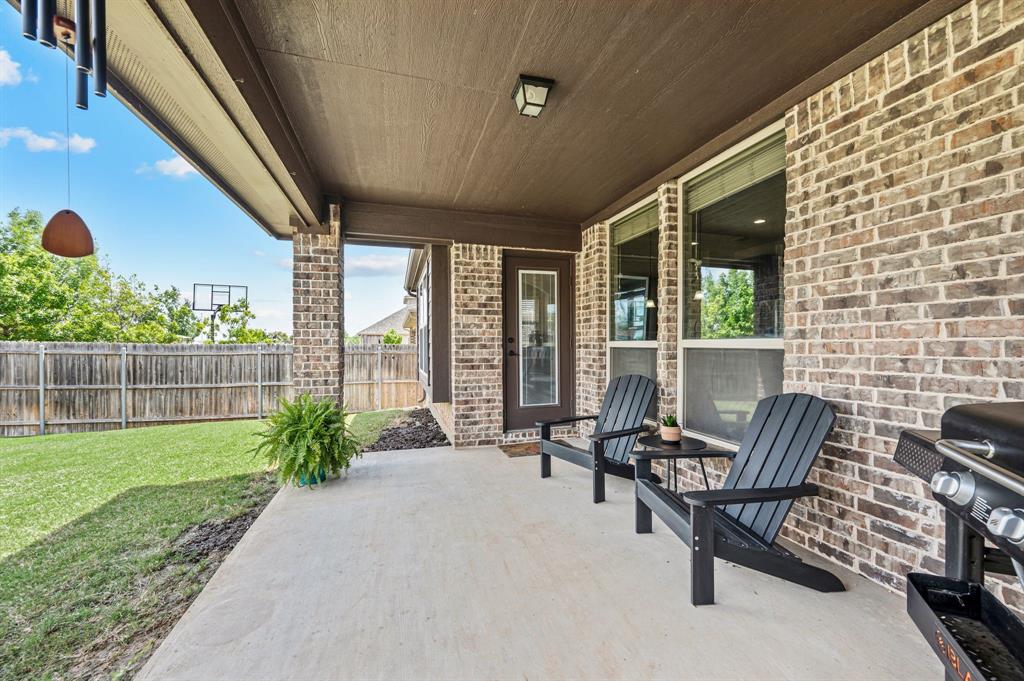5209 Edgebrook Way Fort Worth, TX 76244 - Photo 26 of 33 a building outdoor space with patio furniture
