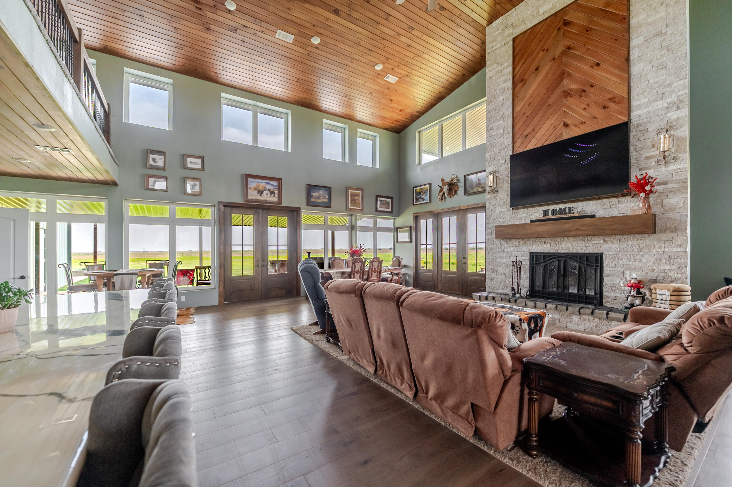 6792 Maine Road Anton, TX 79313 - Photo 9 of 77 a living room with fireplace furniture and a flat screen tv