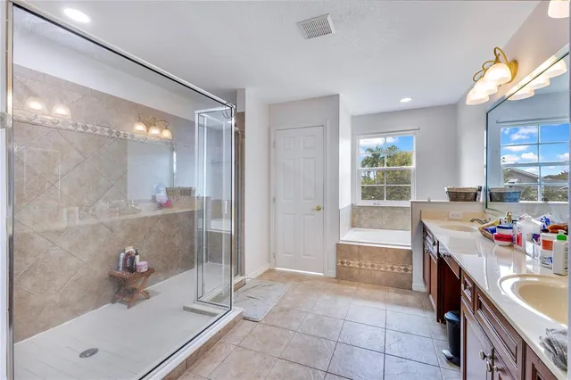 a kitchen with a sink and a refrigerator