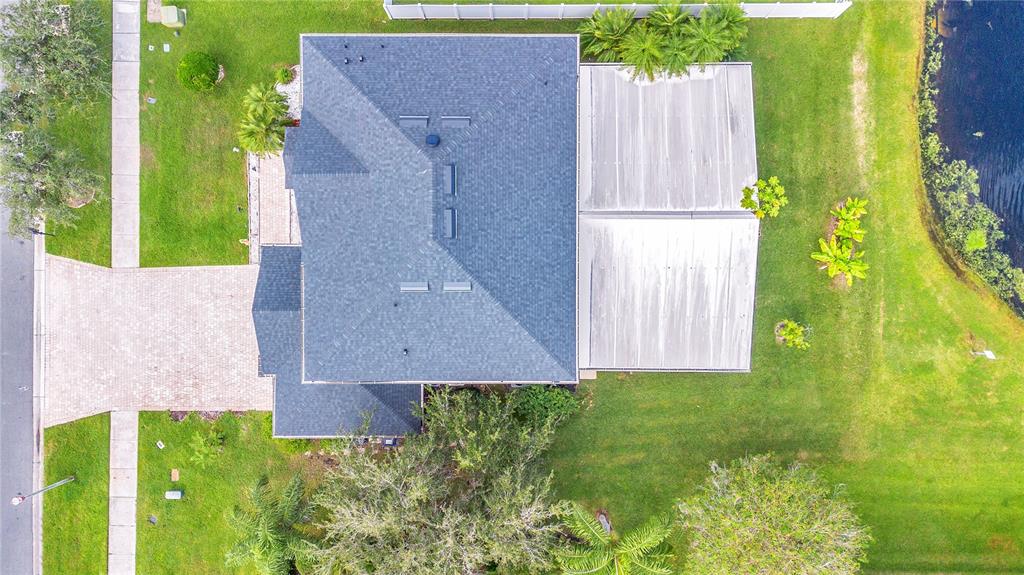 3480 Pawleys Loop North St. Cloud, FL 34769 - Photo 22 of 23 an aerial view of a house with a backyard space