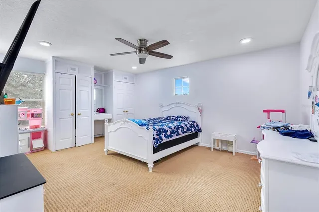 a bedroom with furniture and a bed