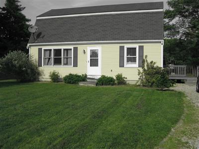 a house view with a garden space
