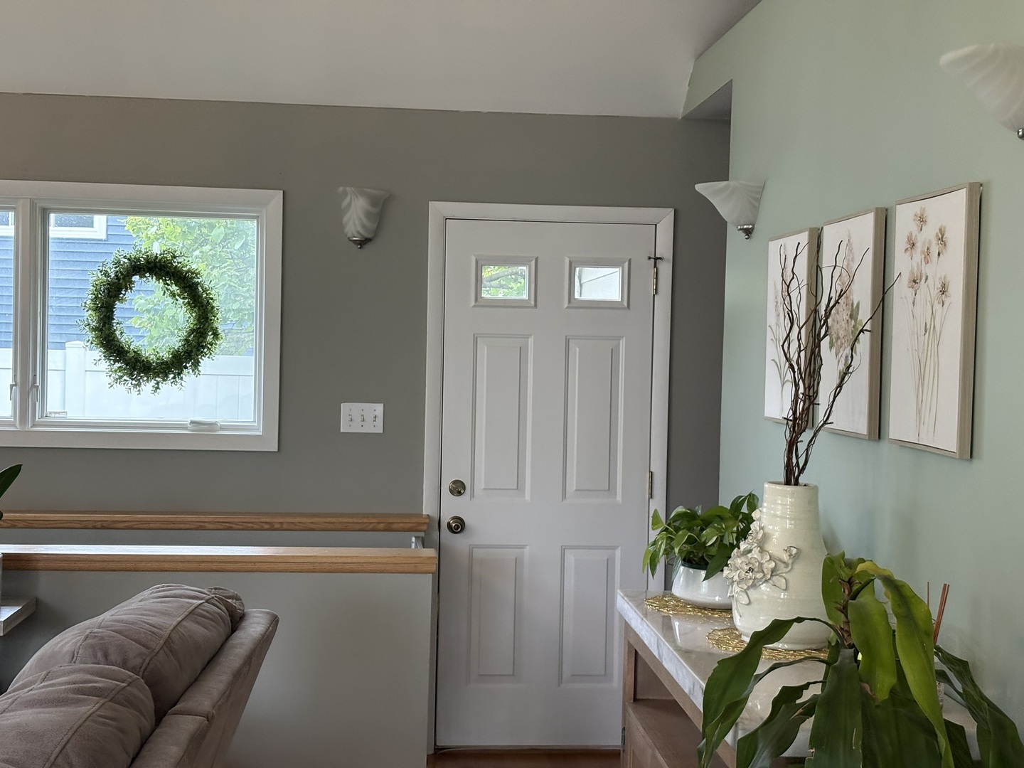 609 West Gartner Road Naperville, IL 60540 - Photo 16 of 23 a living room with furniture and a potted plant