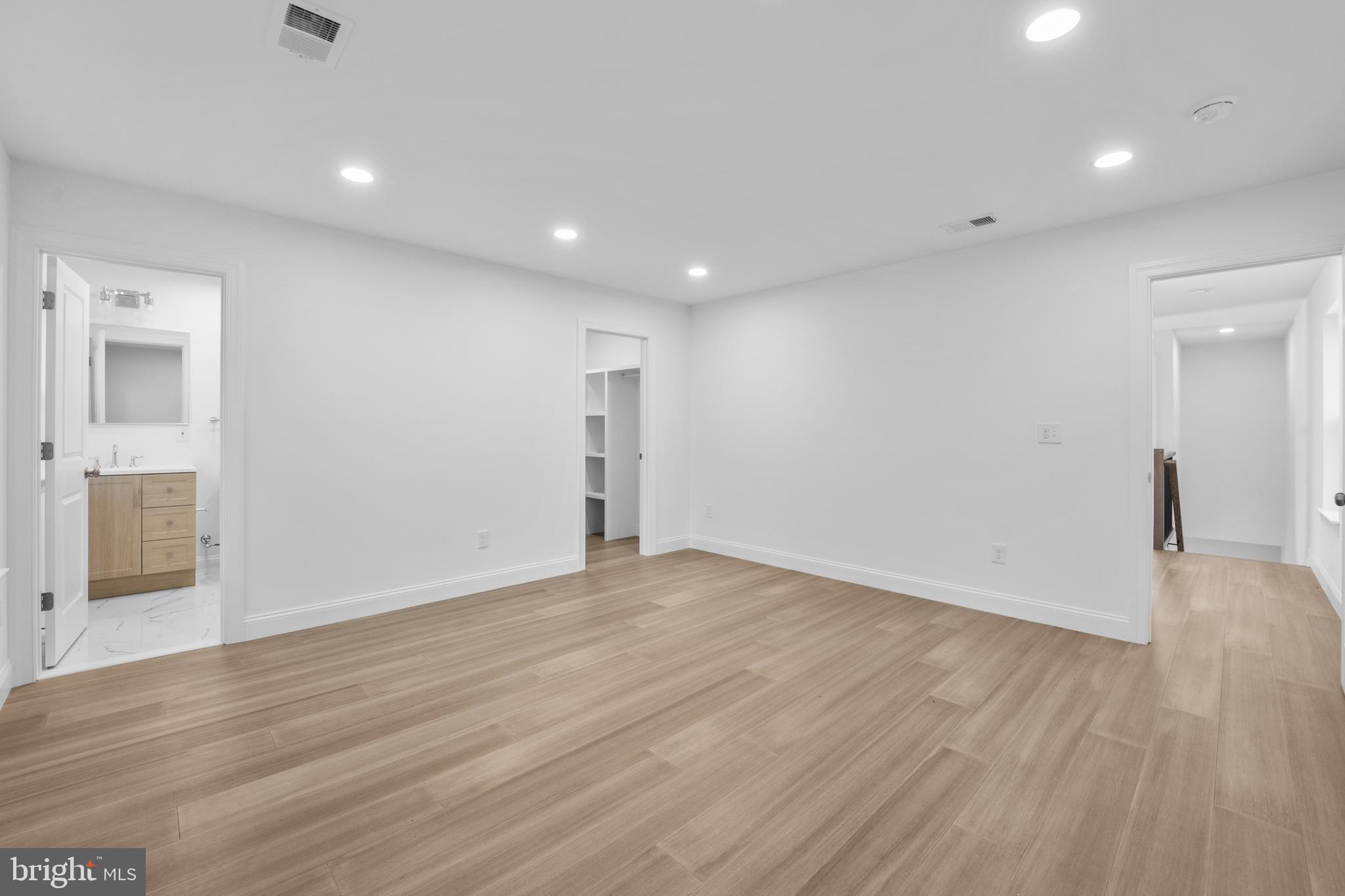 492 Ellis Avenue Lawnside, NJ 08045 - Photo 26 of 33 wooden floor in an empty room with a window
