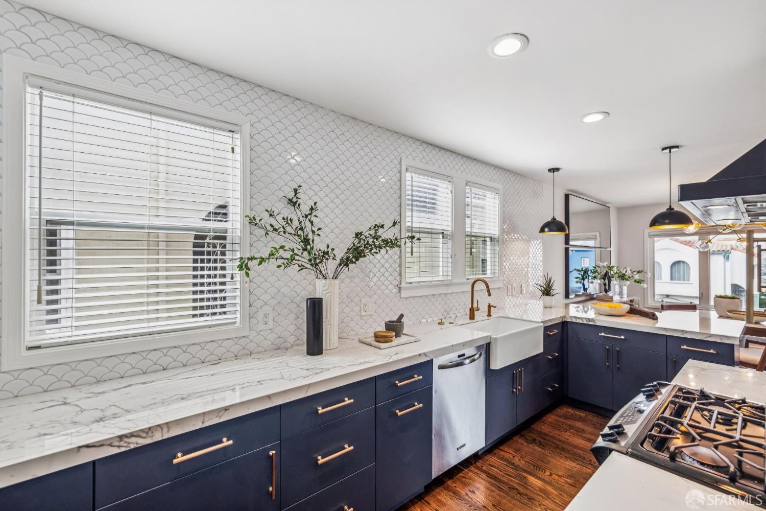 71 Ulloa Street San Francisco, CA 94127 - Photo 11 of 38 a large kitchen with stainless steel appliances granite countertop a sink and wooden cabinets