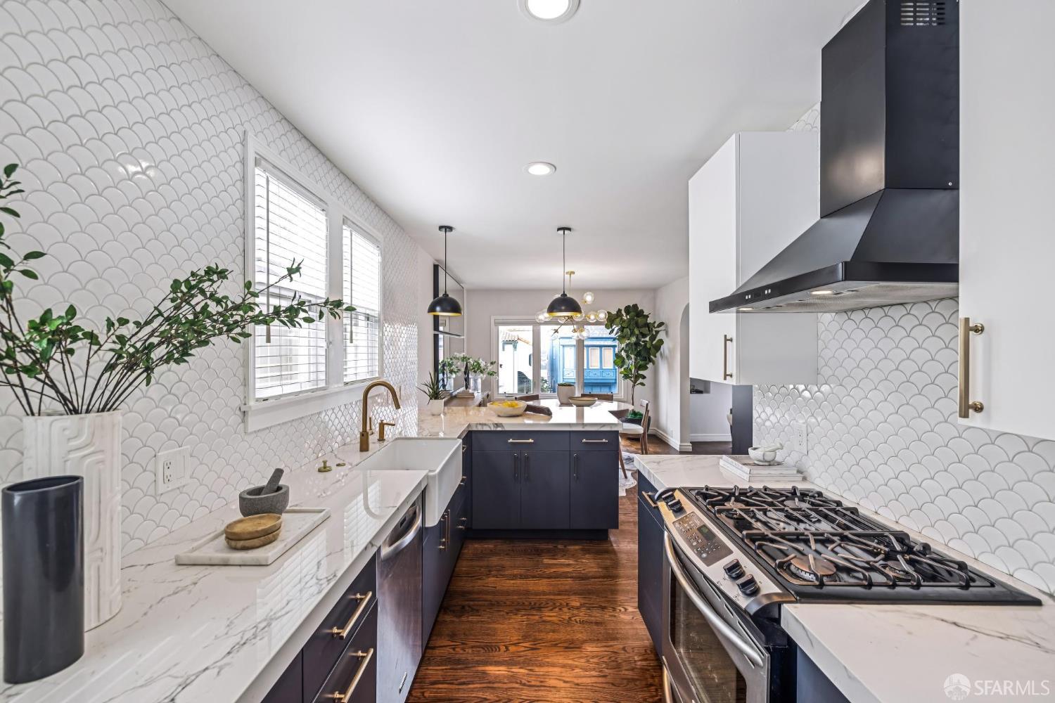 71 Ulloa Street San Francisco, CA 94127 - Photo 13 of 38 a kitchen with sink stove and cabinets