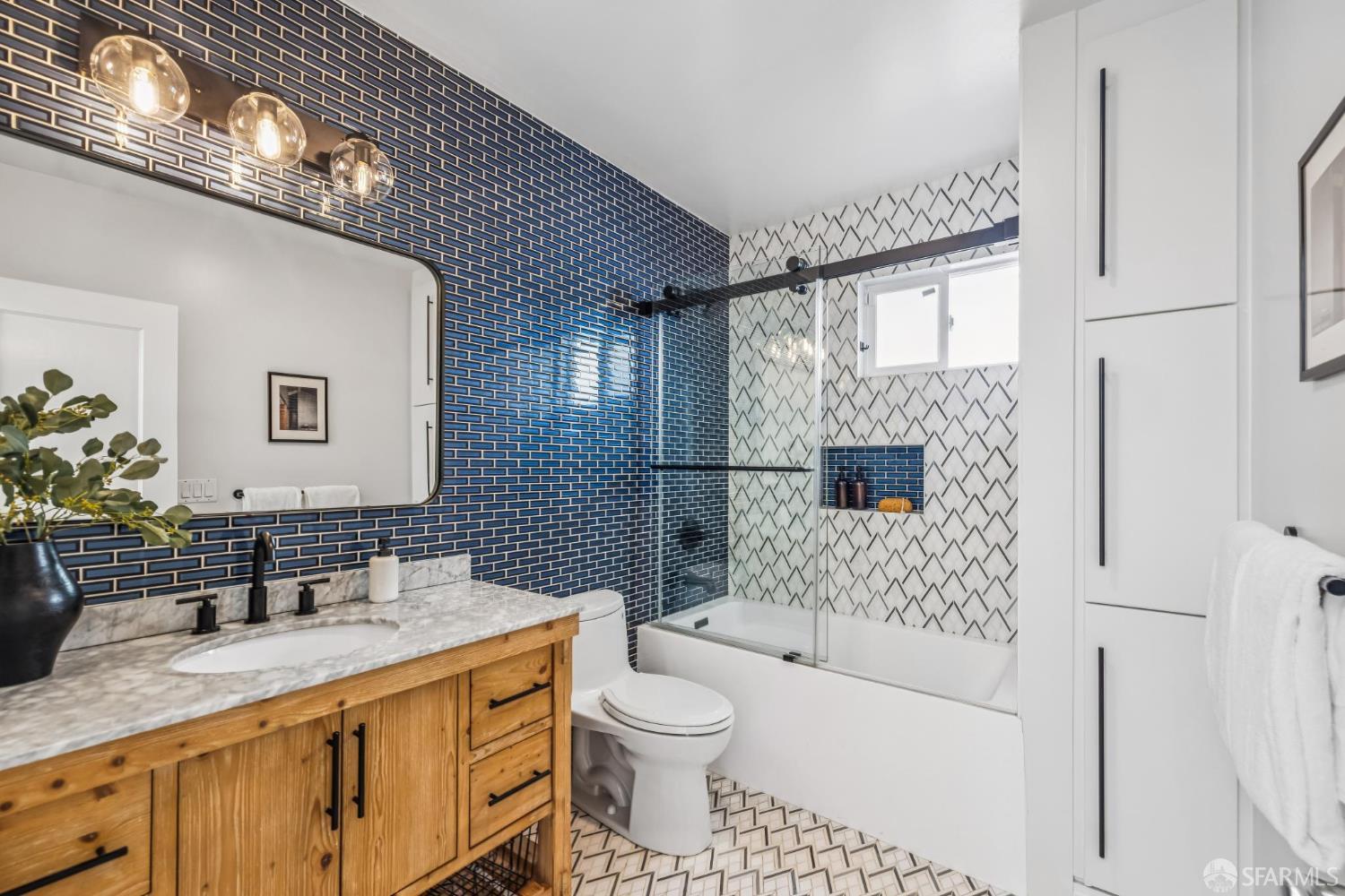 71 Ulloa Street San Francisco, CA 94127 - Photo 20 of 38 a bathroom with a sink a toilet and shower