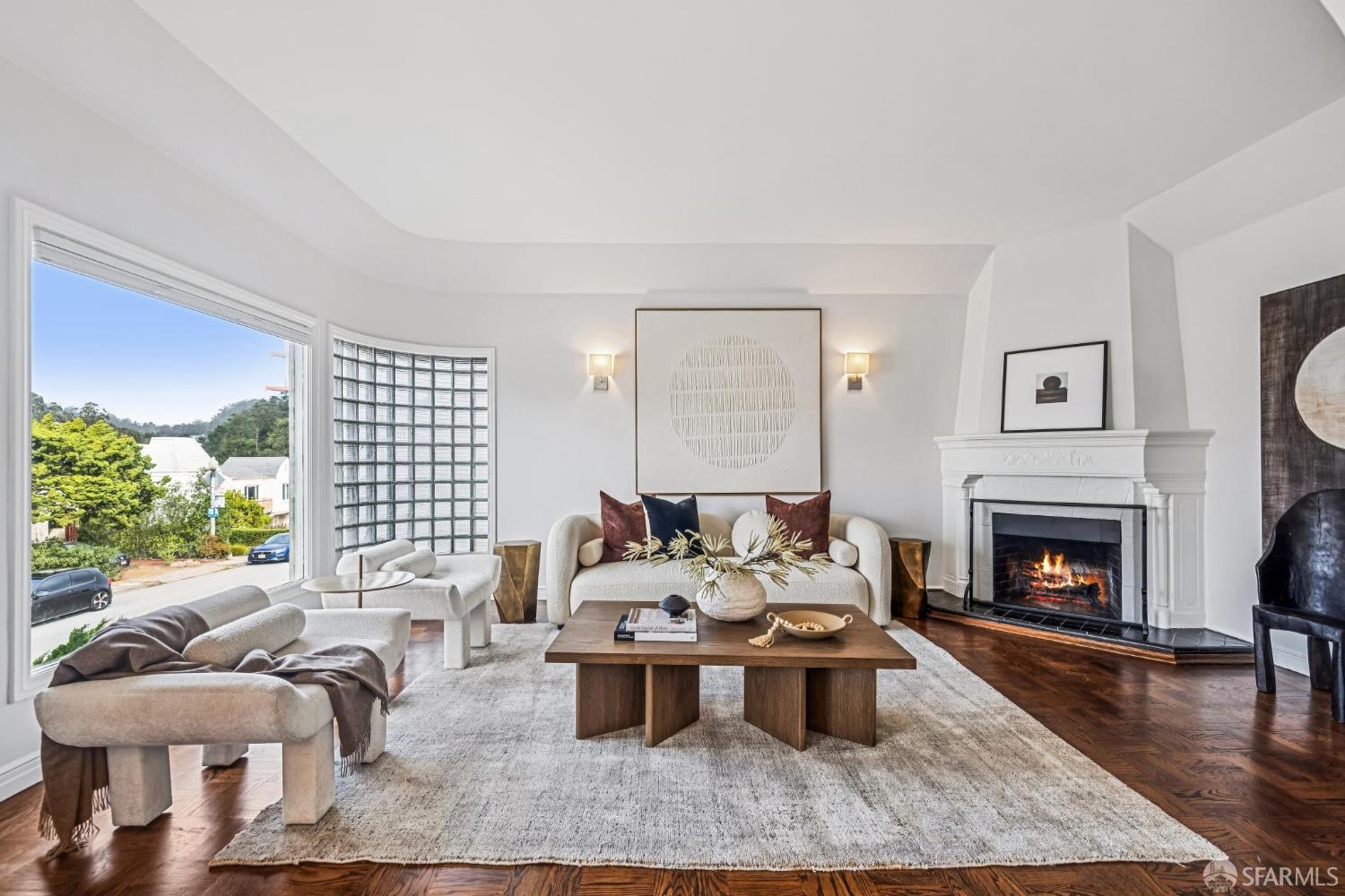 71 Ulloa Street San Francisco, CA 94127 - Photo 2 of 38 a living room with furniture and a fireplace