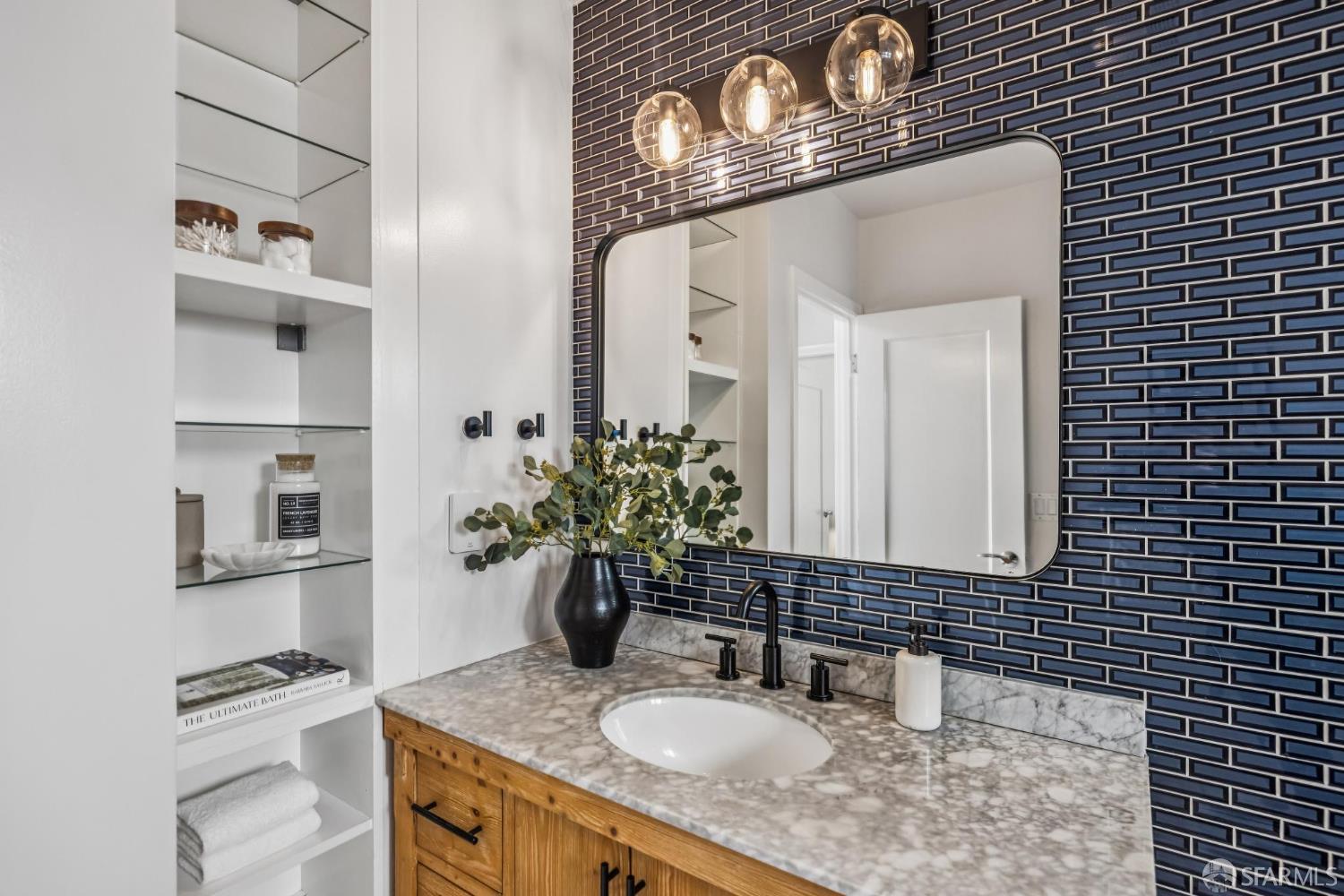 71 Ulloa Street San Francisco, CA 94127 - Photo 22 of 38 a bathroom with a granite countertop sink a vanity and a mirror