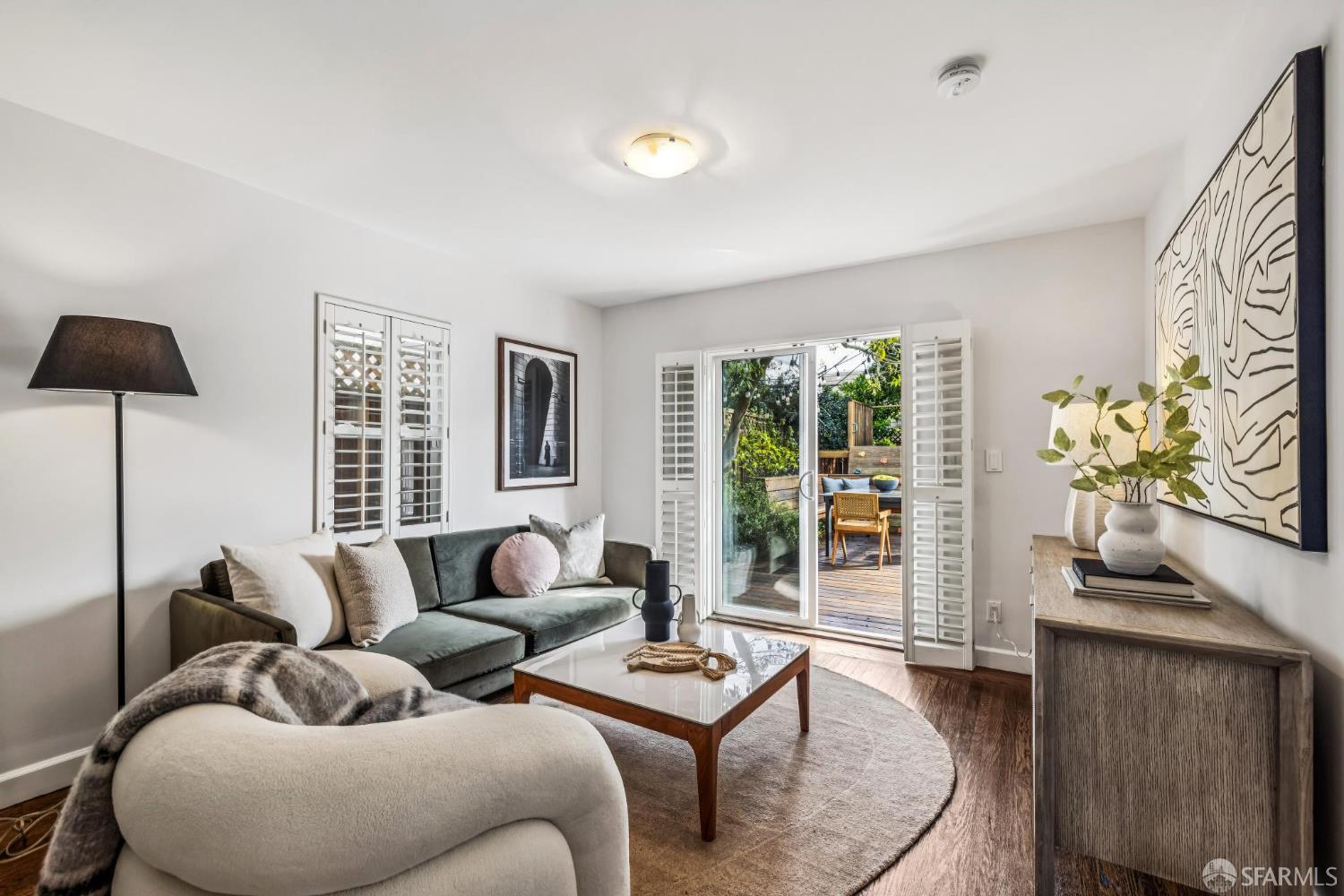 71 Ulloa Street San Francisco, CA 94127 - Photo 25 of 38 a living room with furniture and a flat screen tv
