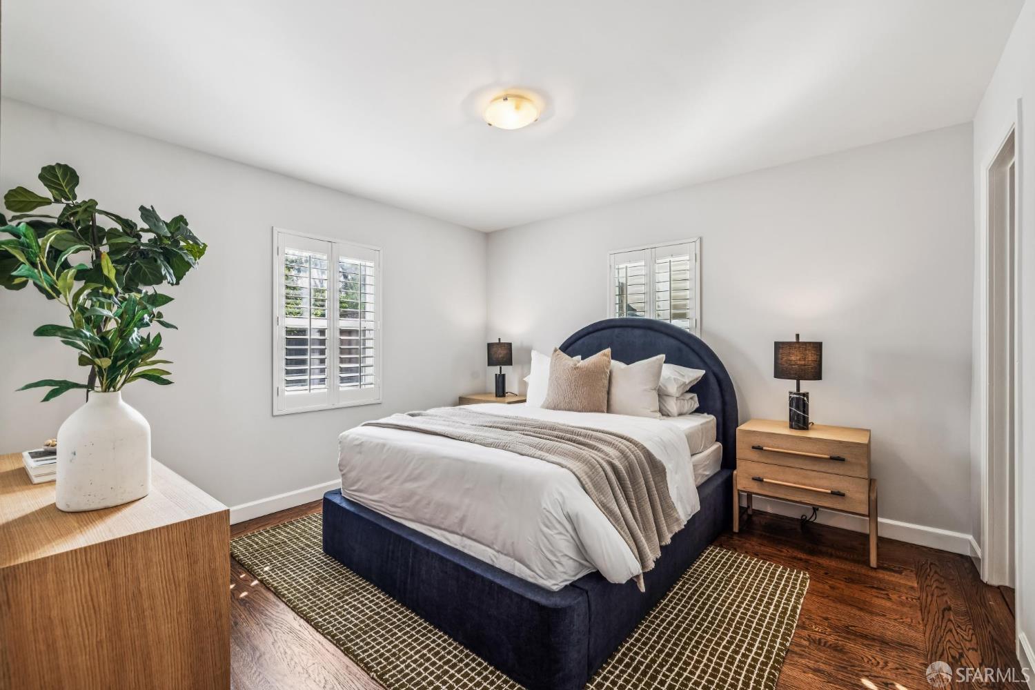 71 Ulloa Street San Francisco, CA 94127 - Photo 27 of 38 a bedroom with a bed and a window