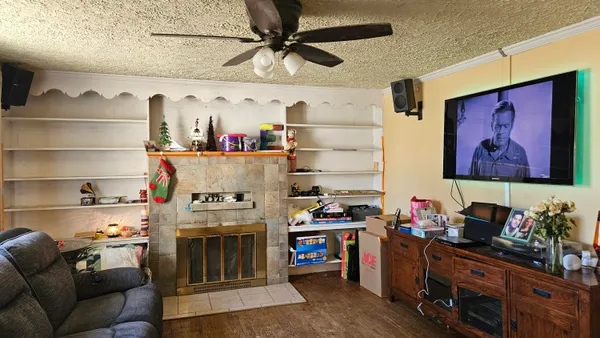 a view of a workspace with furniture