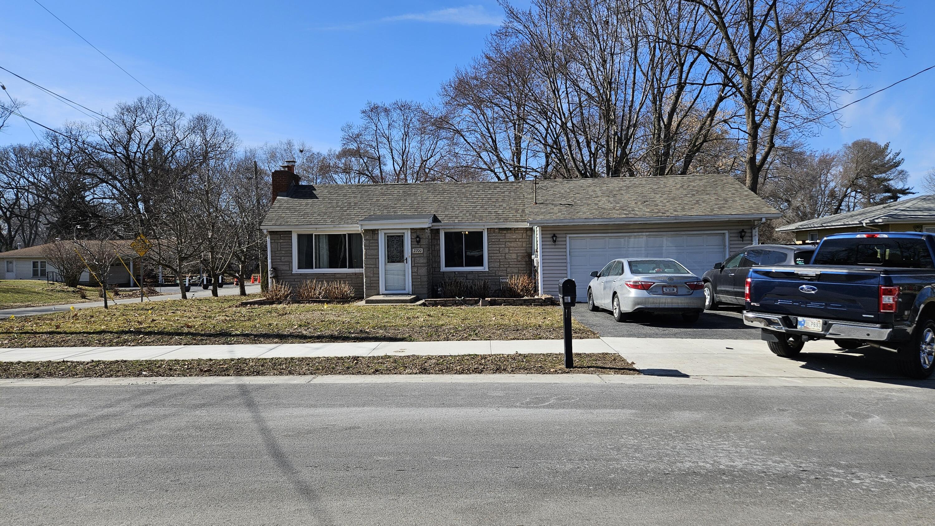 2700 Blake Road Portage, IN 46368 - Photo 8 of 8 a view of a parked cars in front of house