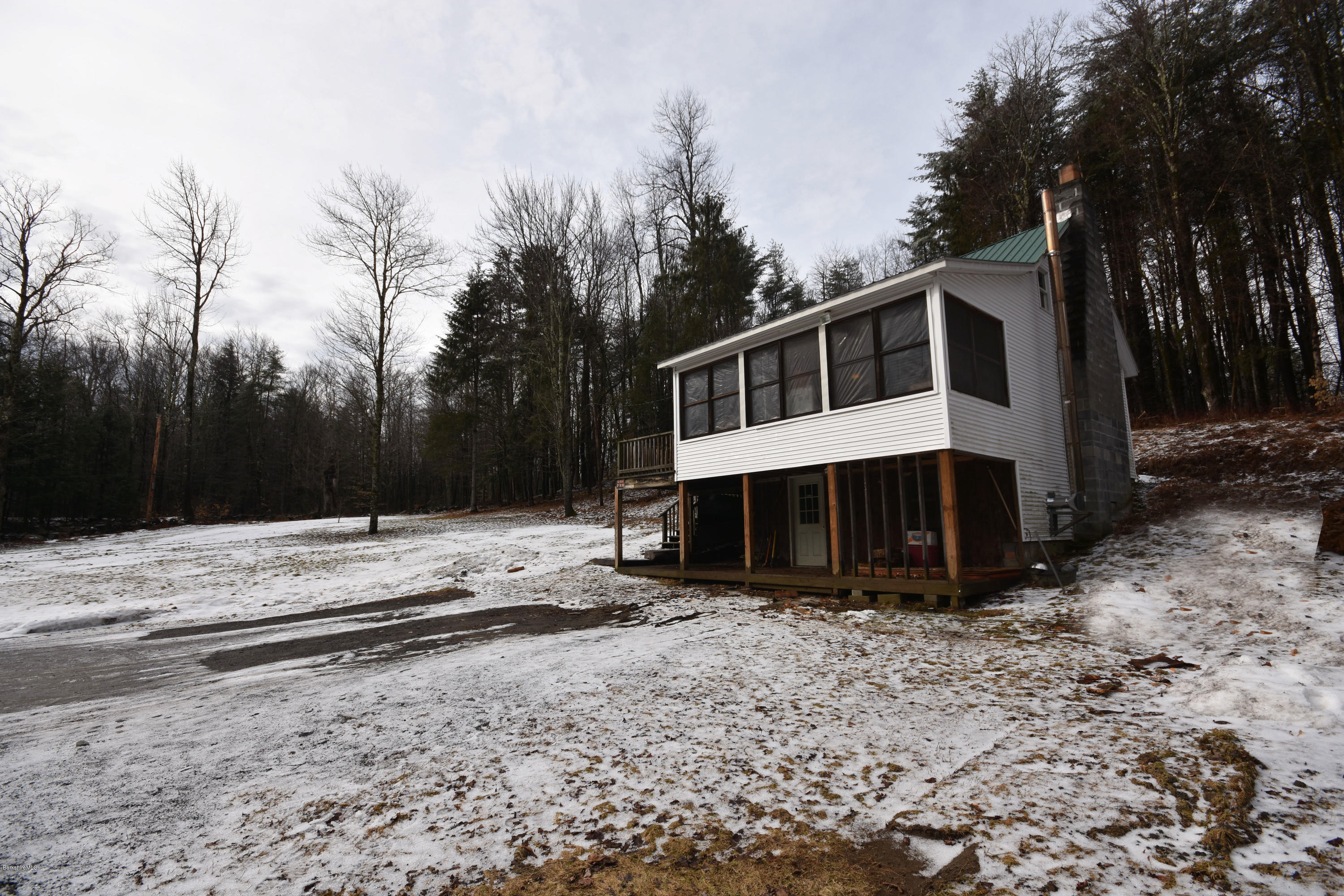 54 Porter Hill Road Cummington, MA 01026 - Photo 22 of 24 a view of a house with a yard
