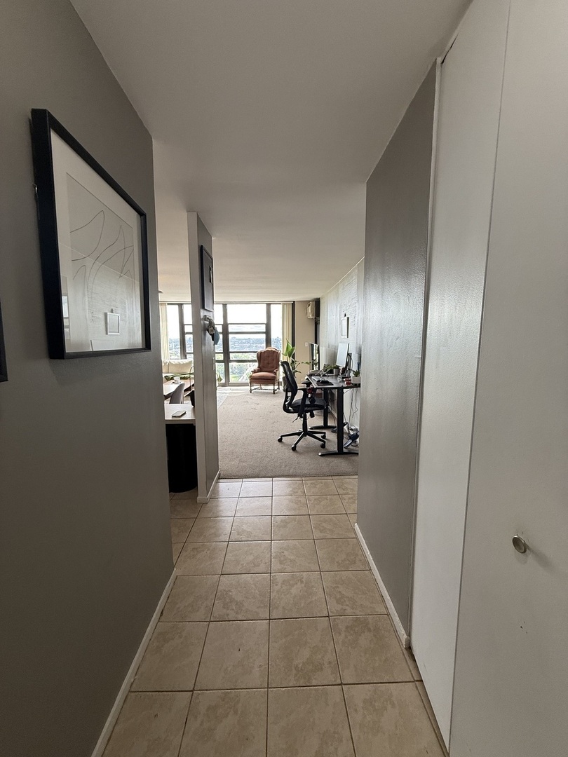 3001 South Michigan Avenue, Unit 2104 Chicago, IL 60616 - Photo 12 of 15 a view of a livingroom with furniture