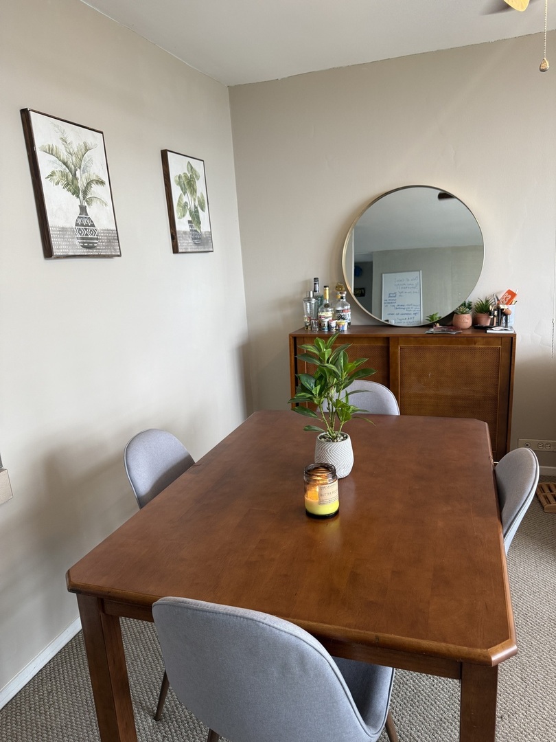 3001 South Michigan Avenue, Unit 2104 Chicago, IL 60616 - Photo 6 of 15 a view of a dining room with furniture