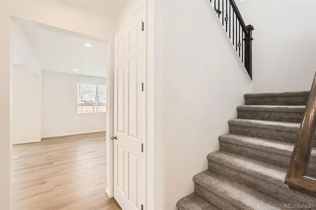 a view of entryway with wooden floor