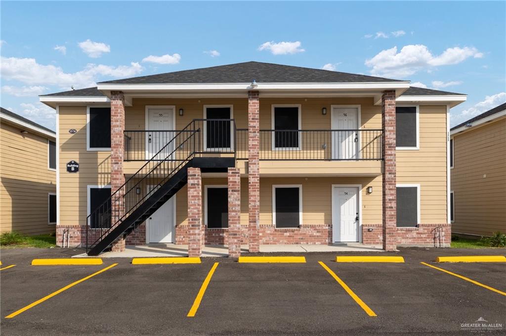 1426 East Rogers Road, Unit 52 Edinburg, TX 78542 - Photo 1 of 13 a view of a house with pool and sitting area