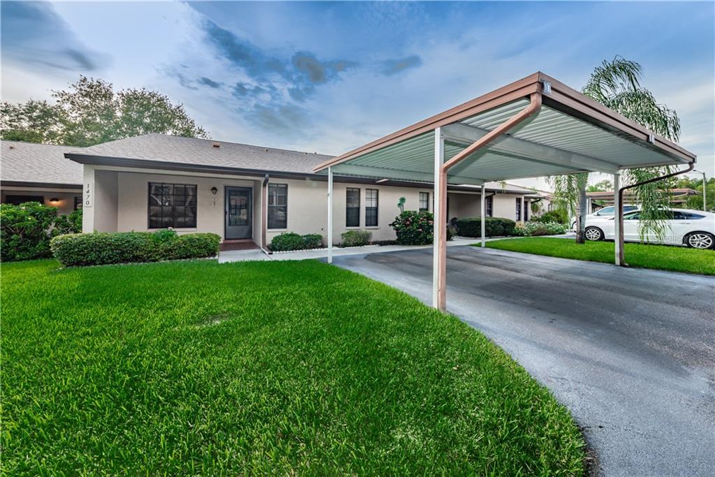 1470 Heather Ridge Boulevard, Unit 107 Dunedin, FL 34698 - Photo 1 of 1 Desirable 2/2 Villa with 1-Car Carport in Heather Ridge.