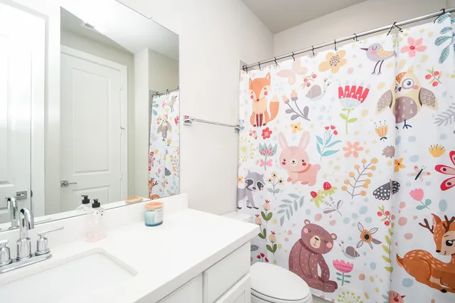 a room that has a table and a chair in it