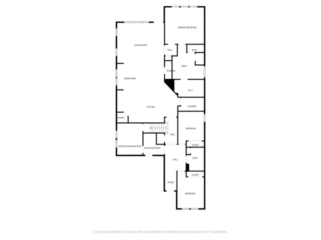 a view of a backyard with a garden and tree