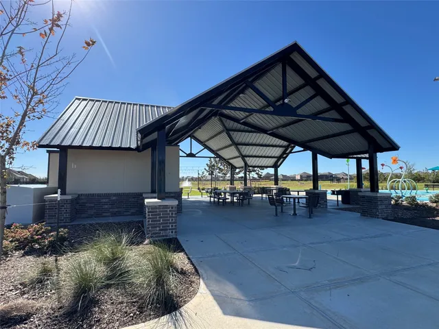 a view of sitting area in front of house