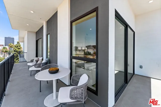 a view of a livingroom with furniture and front door