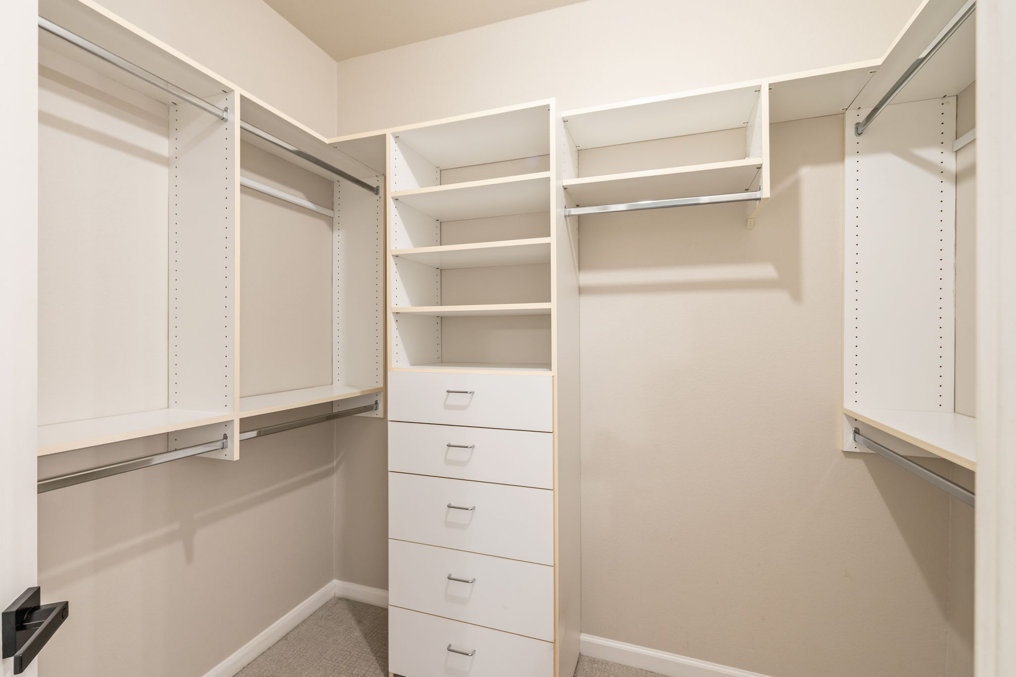 137 Trail Rider Way Georgetown, TX 78633 - Photo 16 of 29 Customizable closet shelving and built-in drawers offer practical storage solutions.