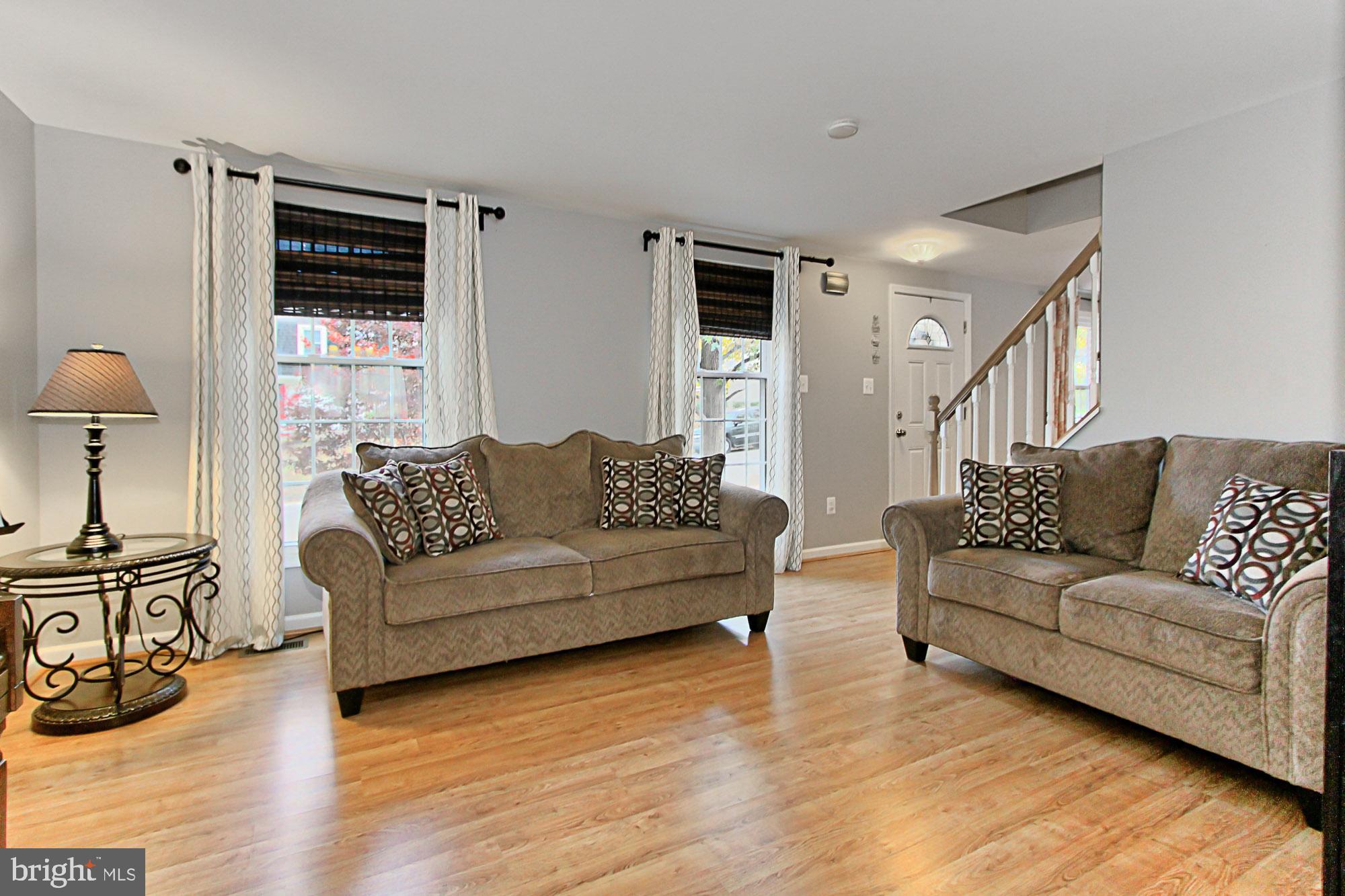 9924 Manet Road Burke, VA 22015 - Photo 7 of 50 Sunlit living room with gorgeous hardwood floors