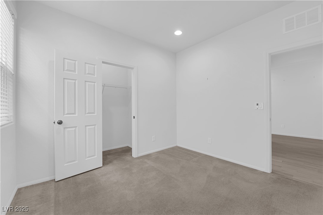 9205 Keystone Ridge Avenue Las Vegas, NV 89148 - Photo 14 of 40 Unfurnished bedroom with recessed lighting, carpet