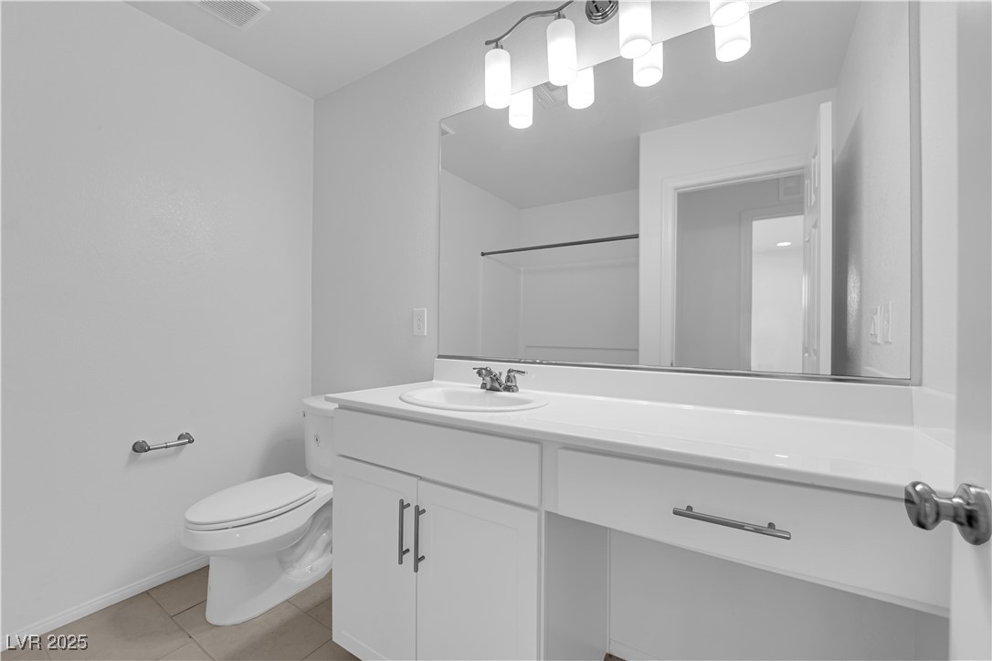 9205 Keystone Ridge Avenue Las Vegas, NV 89148 - Photo 21 of 40 Full bath featuring vanity, tile patterned floors,