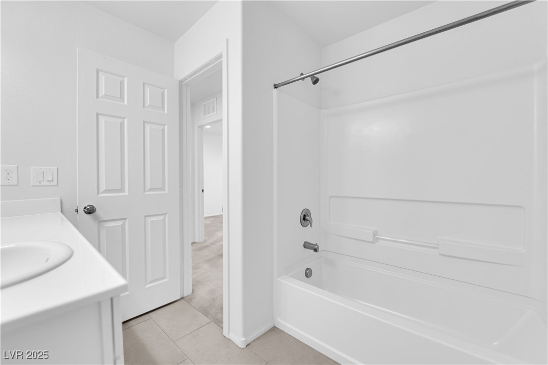 9205 Keystone Ridge Avenue Las Vegas, NV 89148 - Photo 22 of 40 Full bath featuring tile patterned floors, shower