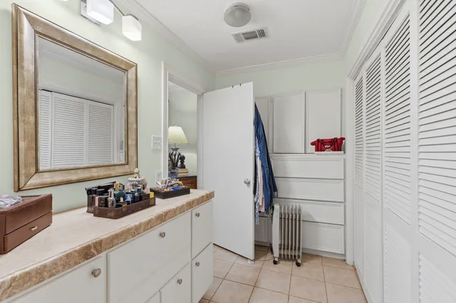 a kitchen with a sink and a stove