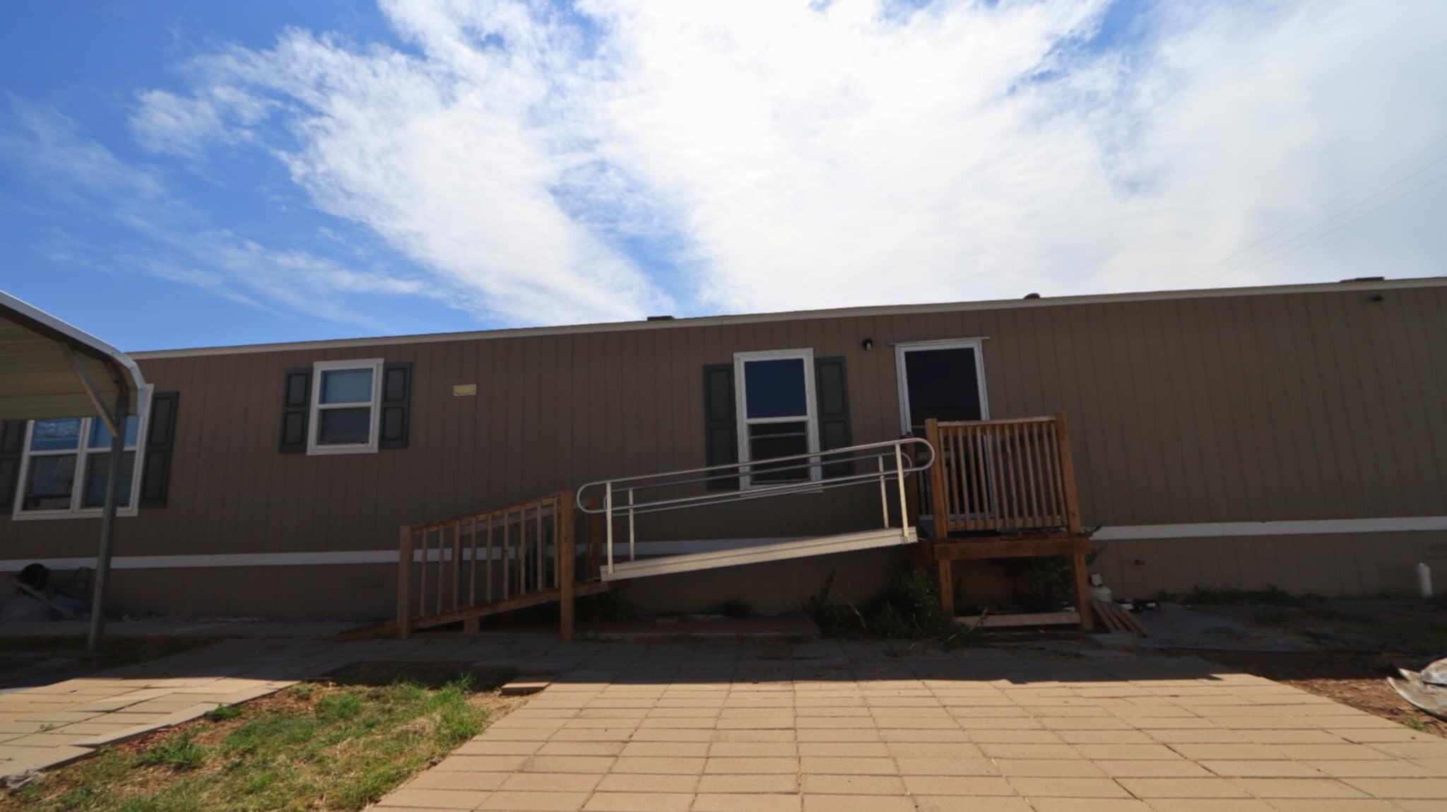 304 3rd Street Wolfforth, TX 79382 - Photo 1 of 16 a side view of a house