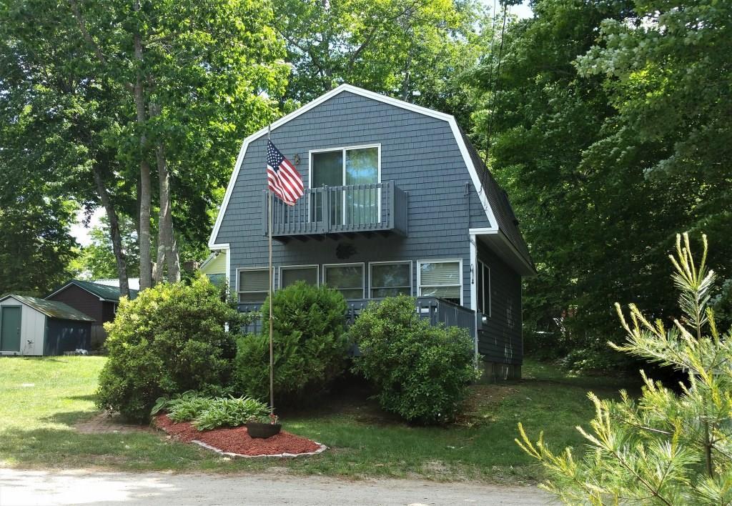 124 Acadia Road Casco, ME 04015 - Photo 1 of 20 124 Acadia Rd front of home well...